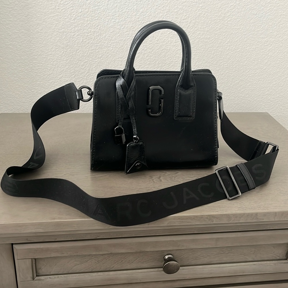 Small black hard shell Marc Jacobs purse